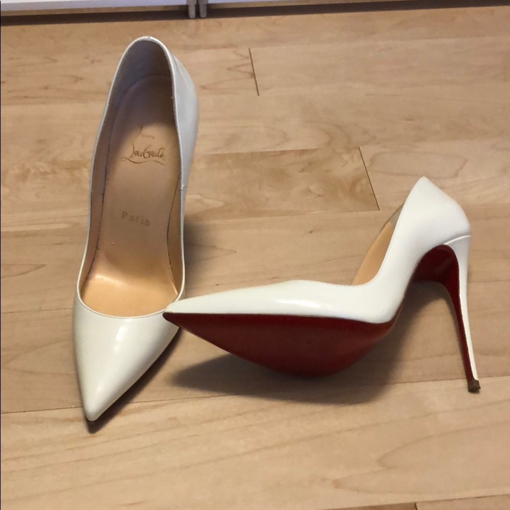 White patent leather Louboutin stilettos